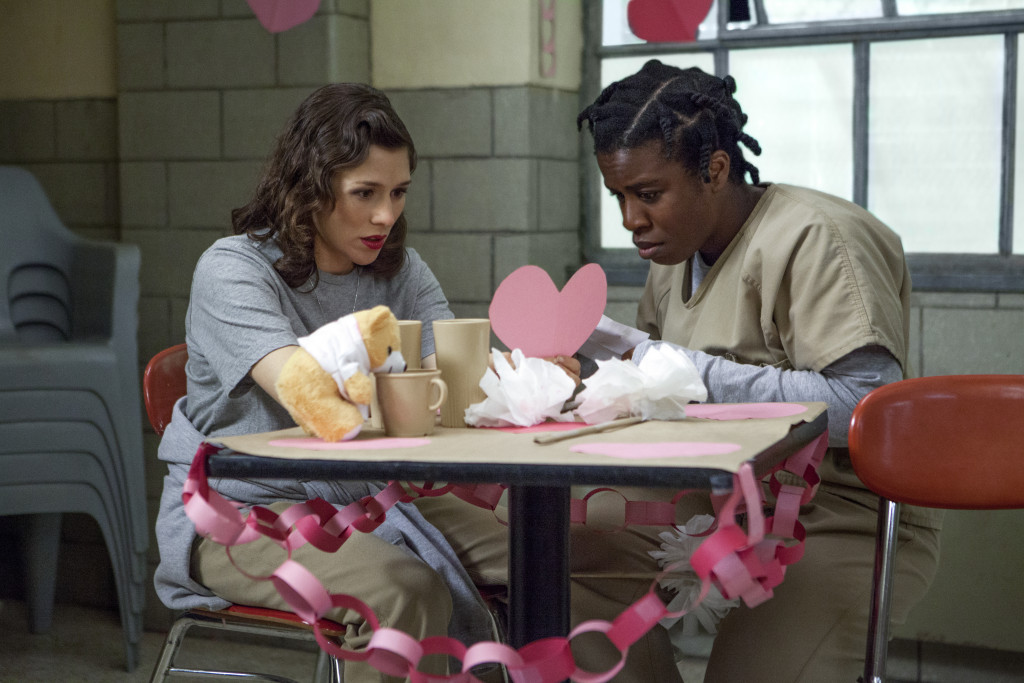 Yael Stone (L) and Uzo Aduba (R) in a scene from "Orange is the New Black" Season 2. Photo credit: K.C. Bailey for Netflix.